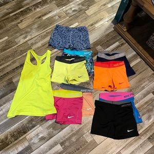 1 Nike Dry-Fit Tank & 9 Nike Pro Women’s Shorts